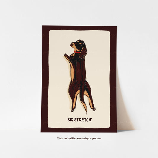 Black and tan dachshund Big Stretch art print on a cream background with a dark brown border.