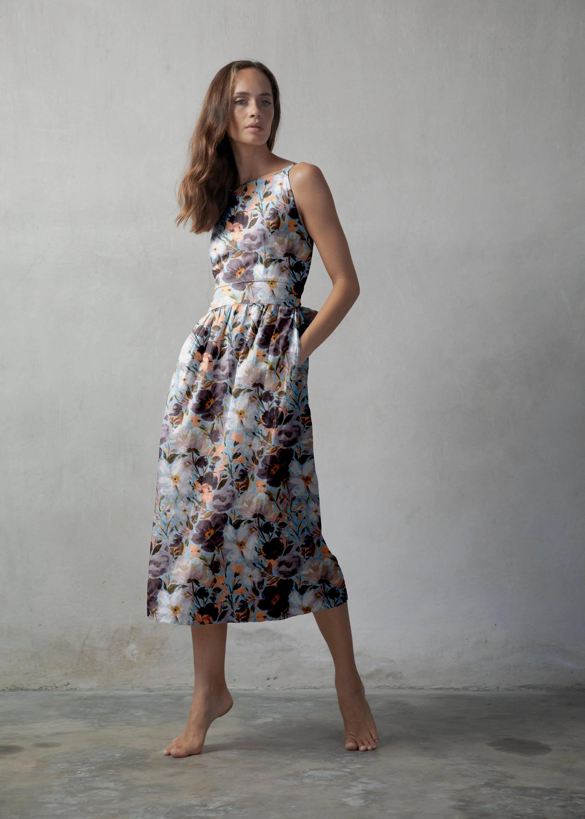 Vintage floral textile pattern design on a long linen dress