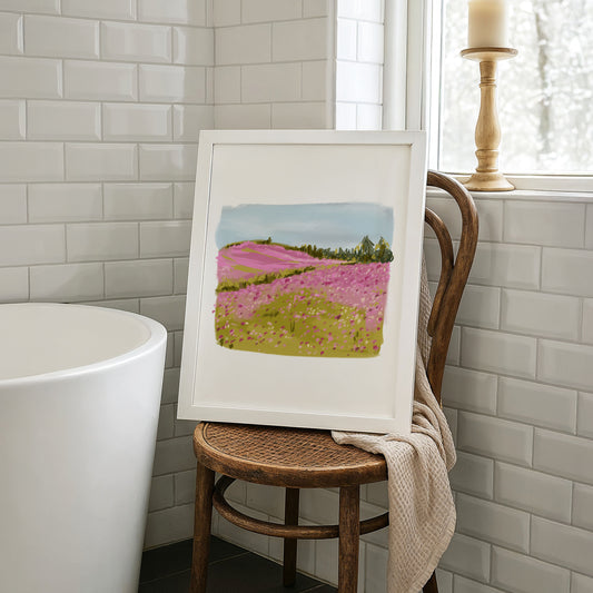 Floral landscape with dreamy pastel tones captured in a white minimalist bathroom.
