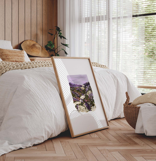Purple heather wildflower print with hillside landscape captured in a modern wooden bedroom