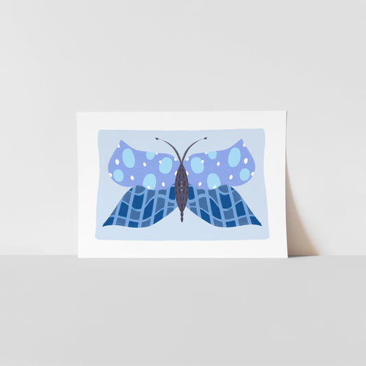 Art print with a blue butterfly design on a light blue background