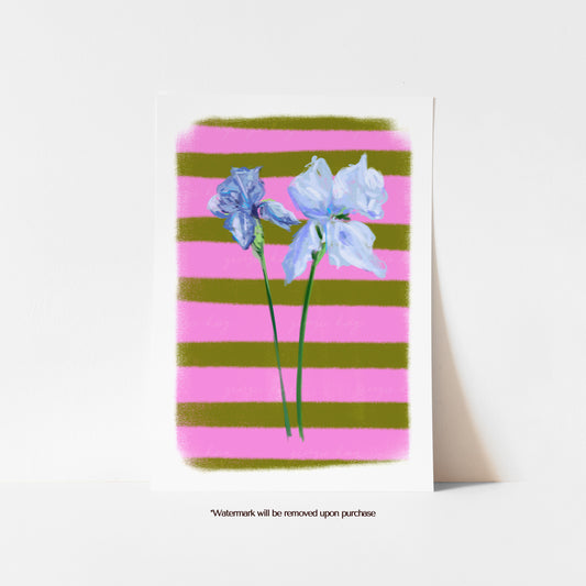 A colourful iris print featuring two soft blue blooms against bold pink and green stripes.