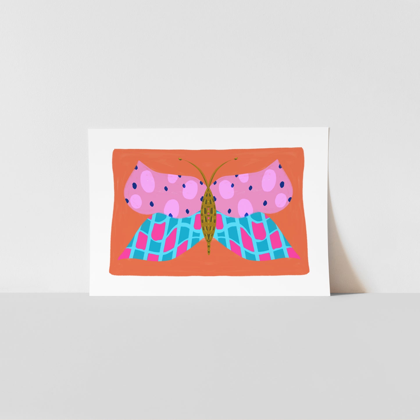 Art print with a colourful butterfly design on an orange background
