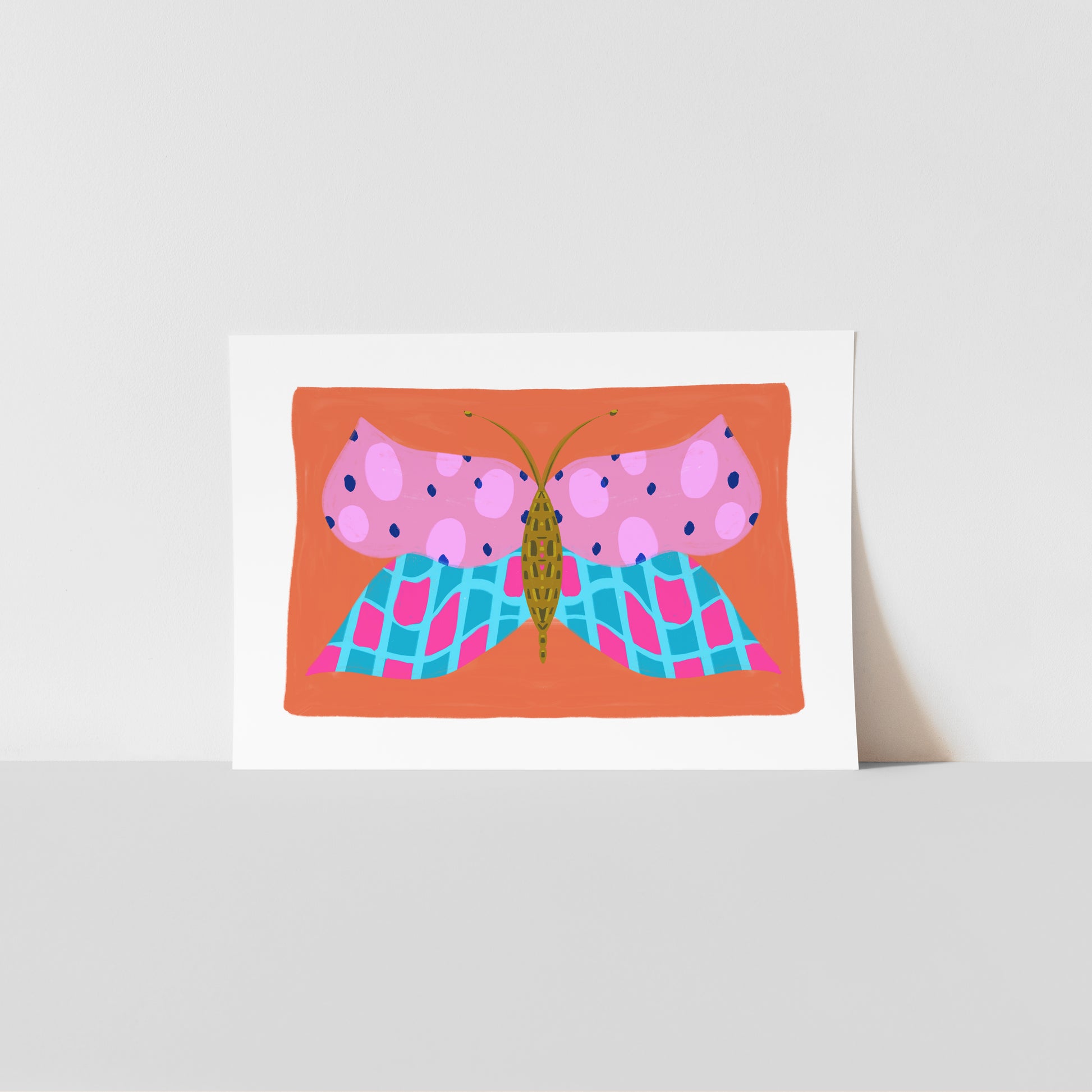 Art print with a colourful butterfly design on an orange background