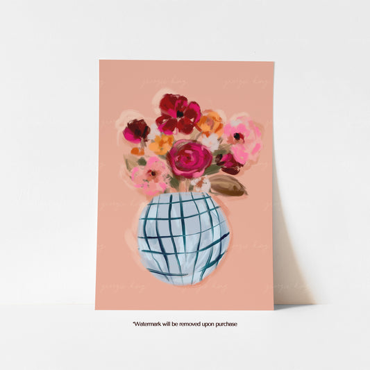 Pink and burgundy flower print in a blue checked vase against a soft peach background
