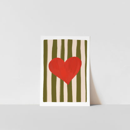 Art print with a red heart on a striped background