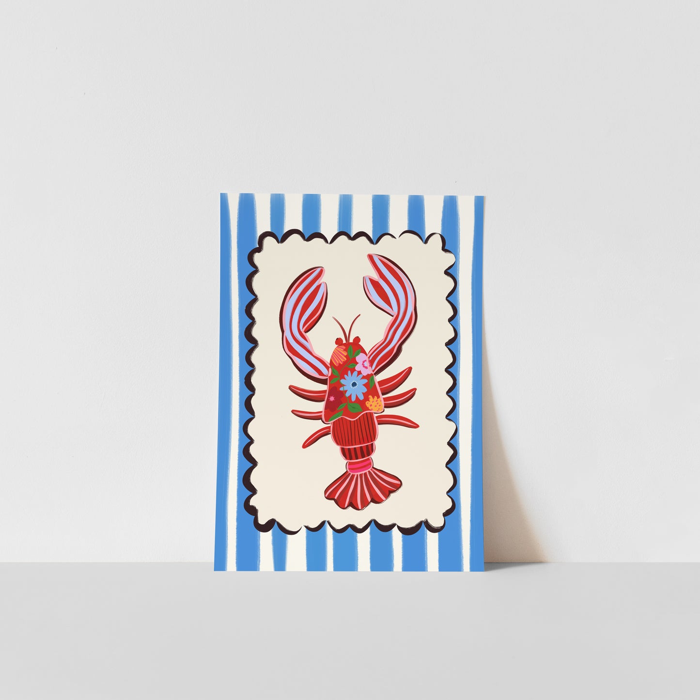 Art print with a red lobster design on a blue and white striped background