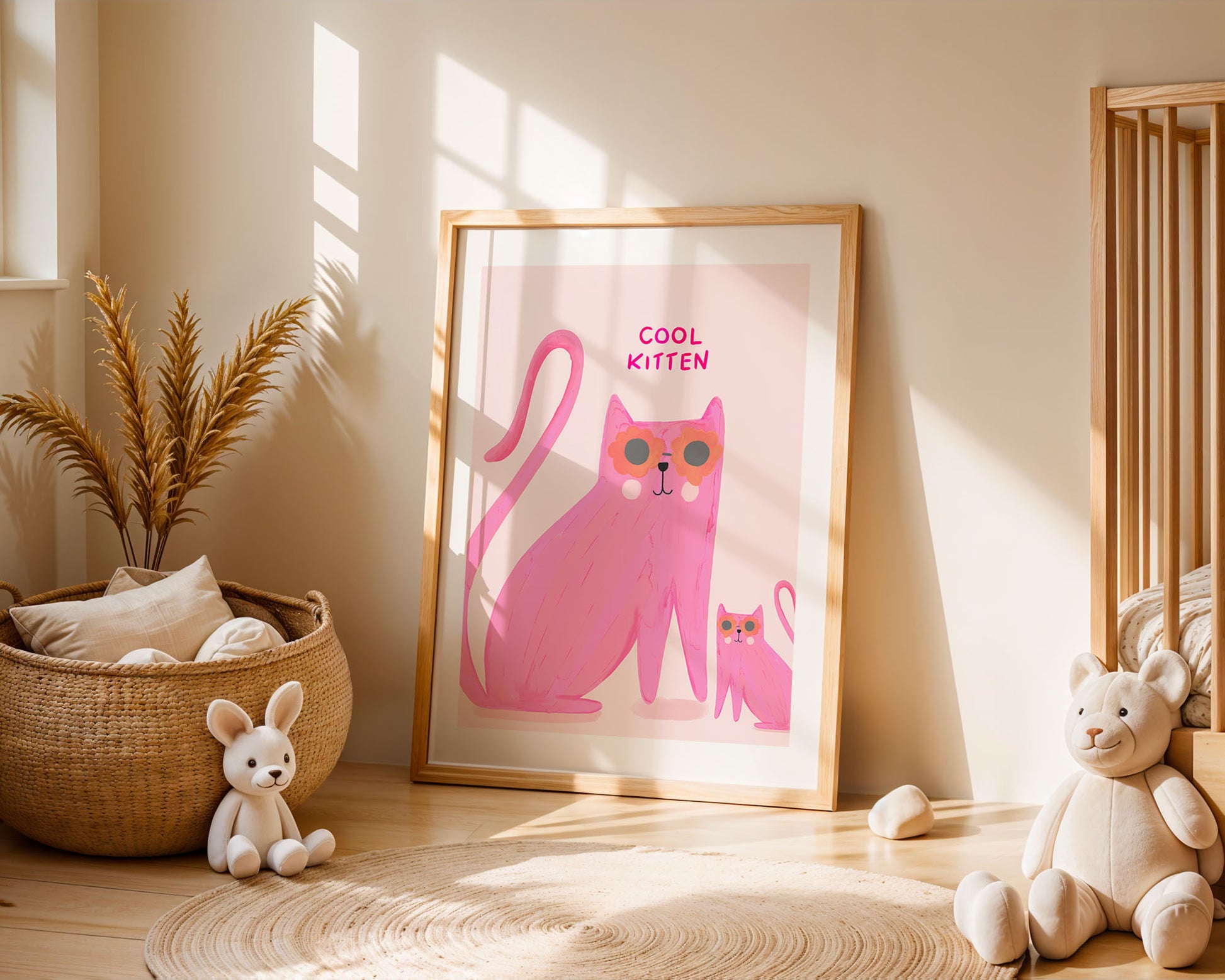 Framed artwork of a pink cat with 'Cool Kitten' text in a room with toys and decor.