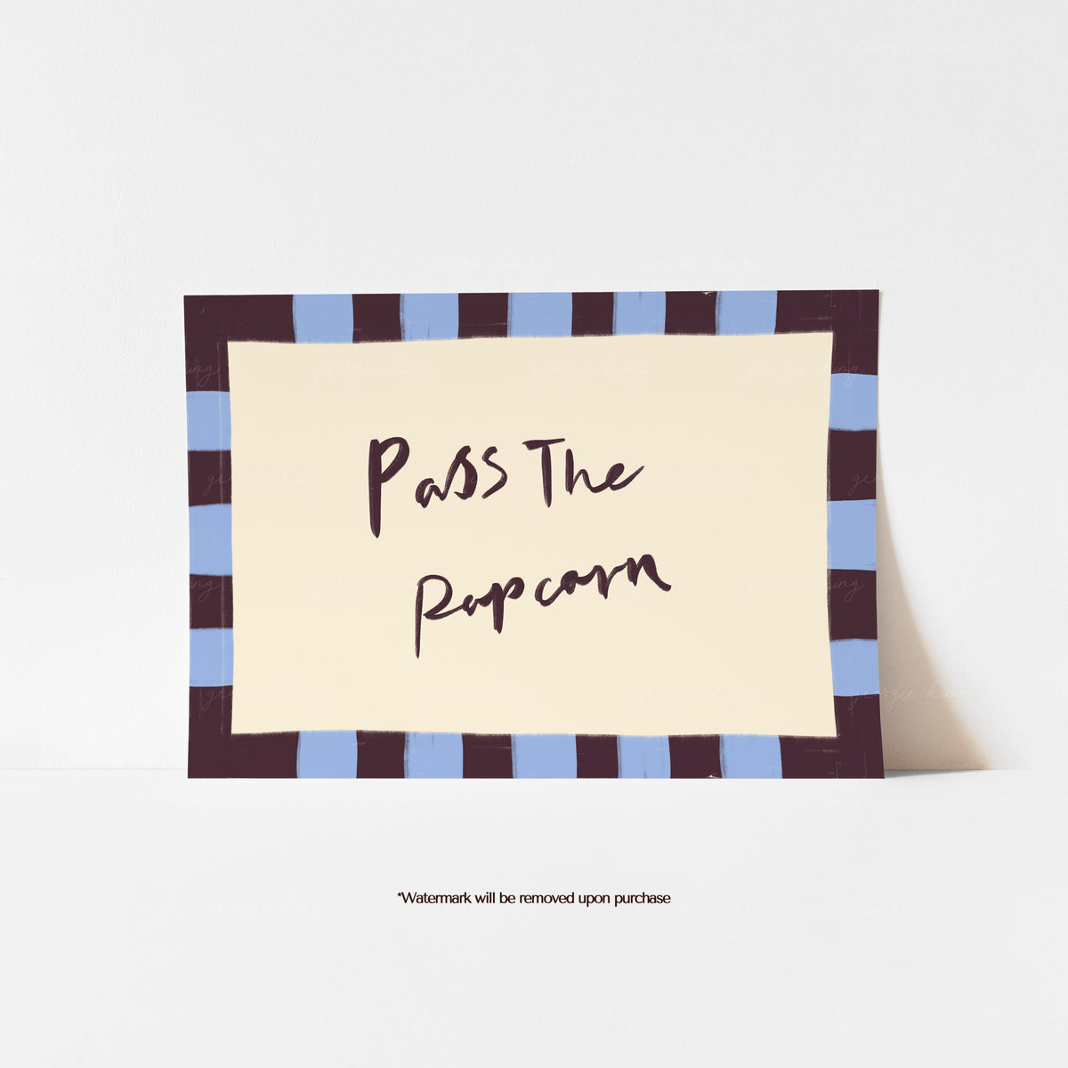 Pass the Popcorn text art print with dark brown lettering on a cream background and blue and brown striped painted border.