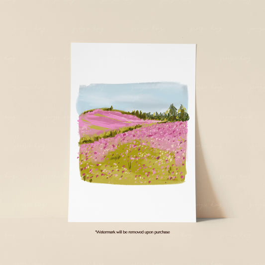 Pink meadow landscape print featuring rolling fields of pink and green wildflowers beneath a pale blue sky
