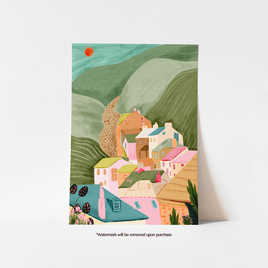 Colourful Port Isaac Cornwall print with pastel fishing village cottages nestled between rolling green hills
