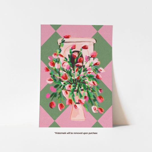 Quirky bathroom wall art print featuring a pink toilet overflowing with flowers on a pink and green checked background